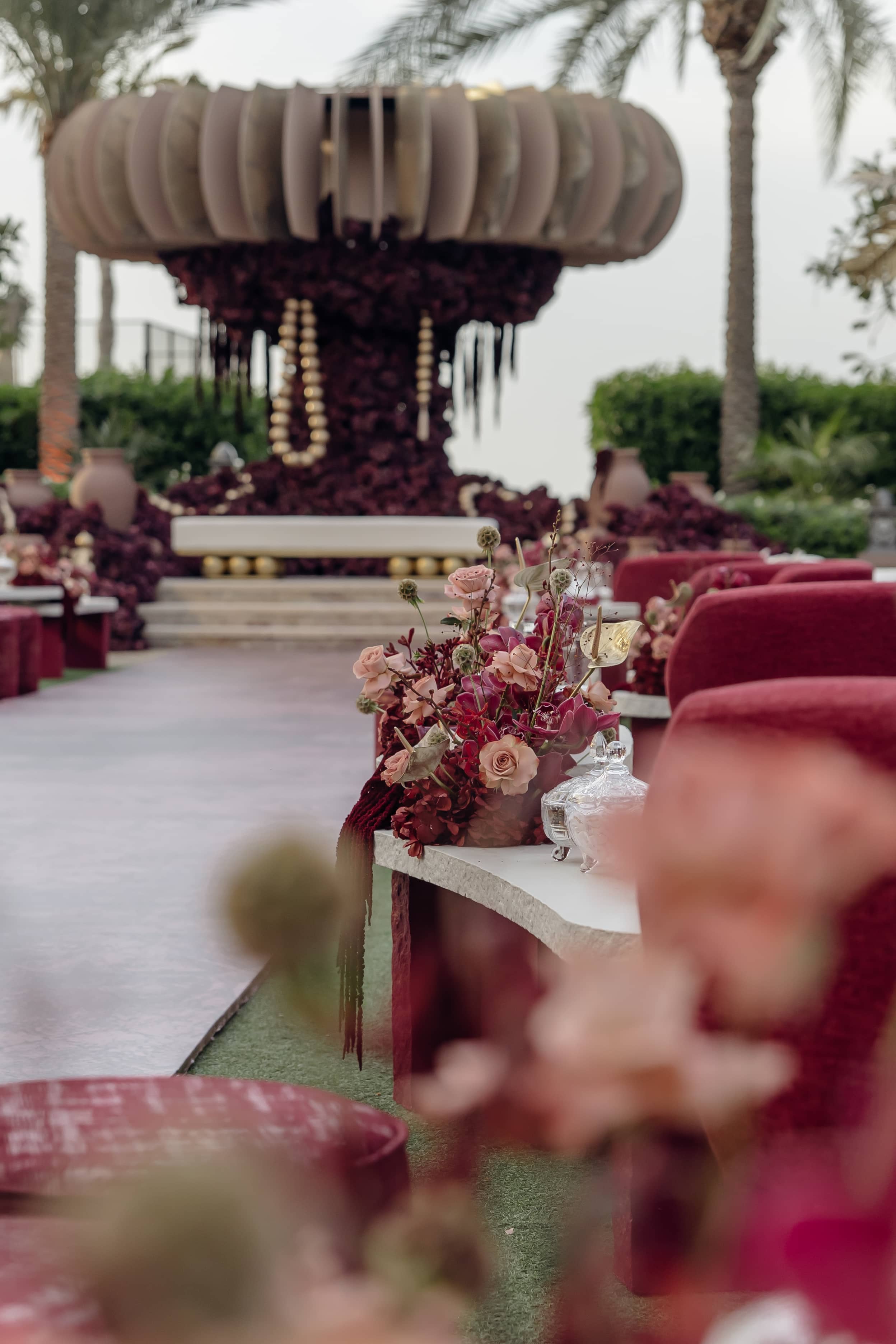 Luxury lounge seating and floral details at a destination event.